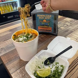Birria ramen with can drink